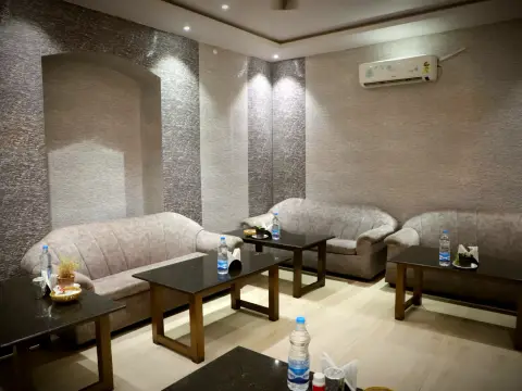 Interior seating area at Asansol Club