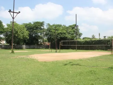 Outdoor net court and grounds at Bokaro Club