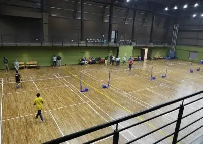 Indoor badminton hall in use at Deccan Gymkhana