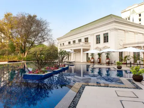 Swimming pool and clubhouse terrace — DLF Club 4