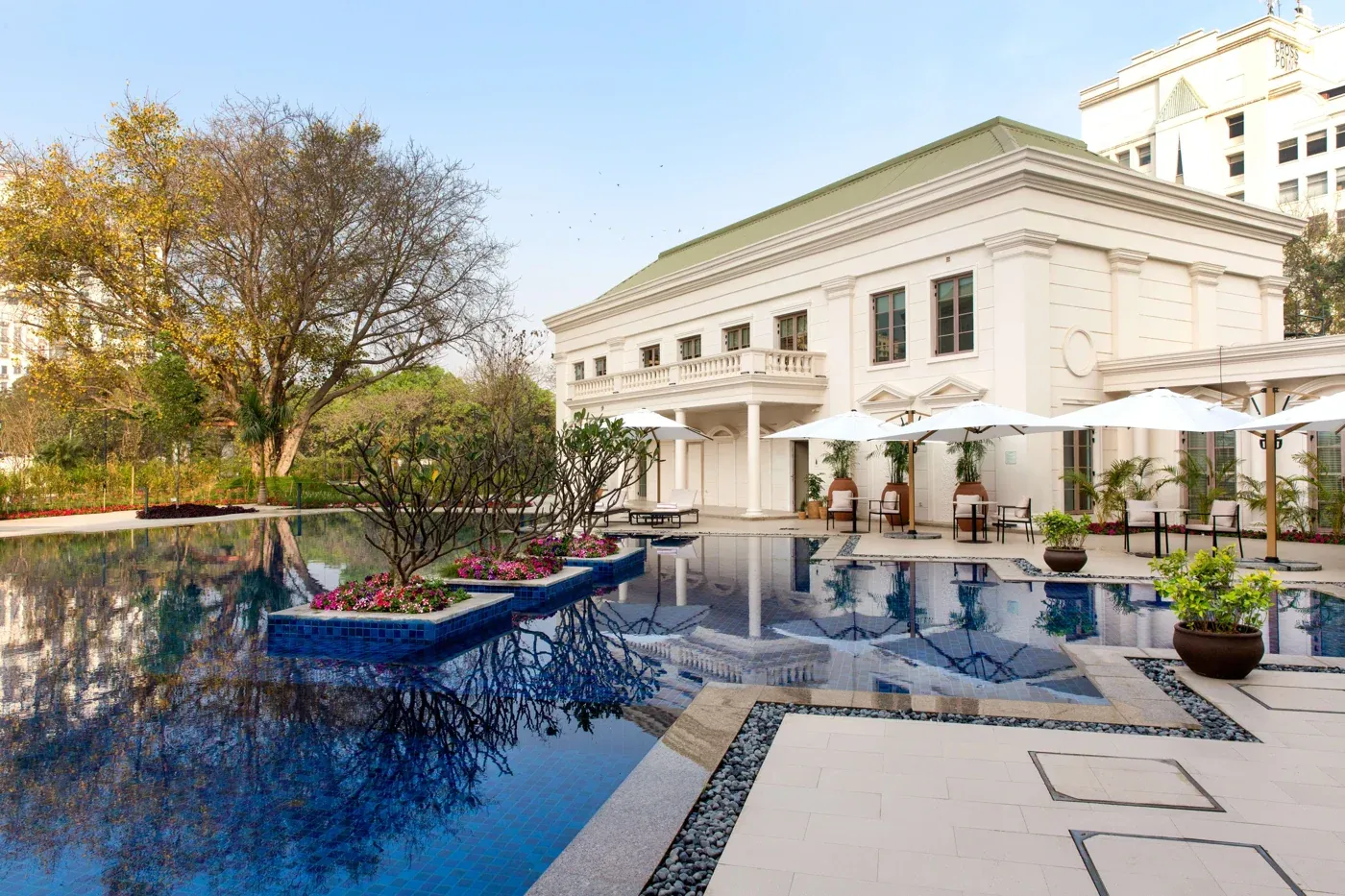 Swimming pool and clubhouse terrace — DLF Club 4