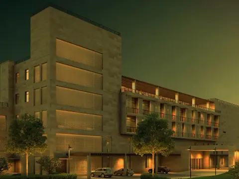 Gujarat Cricket Association Club House exterior at night