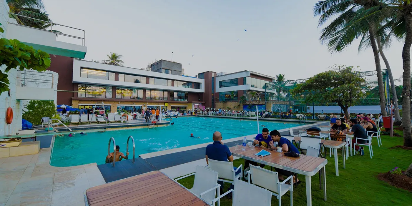 Swimming pool and poolside seating at Otters Club