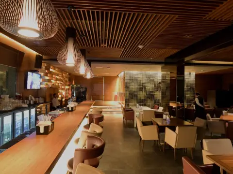 Dining and bar interior at Otters Club