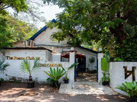 Cedar Oak Cafe entrance at The Poona Club